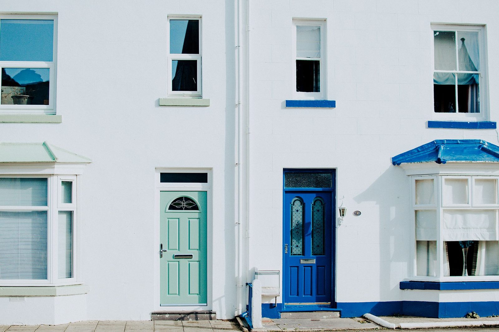 Front door of a residential home with secure deadbolt lock and keys